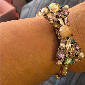 Multi-jewel bow bangle bracket.